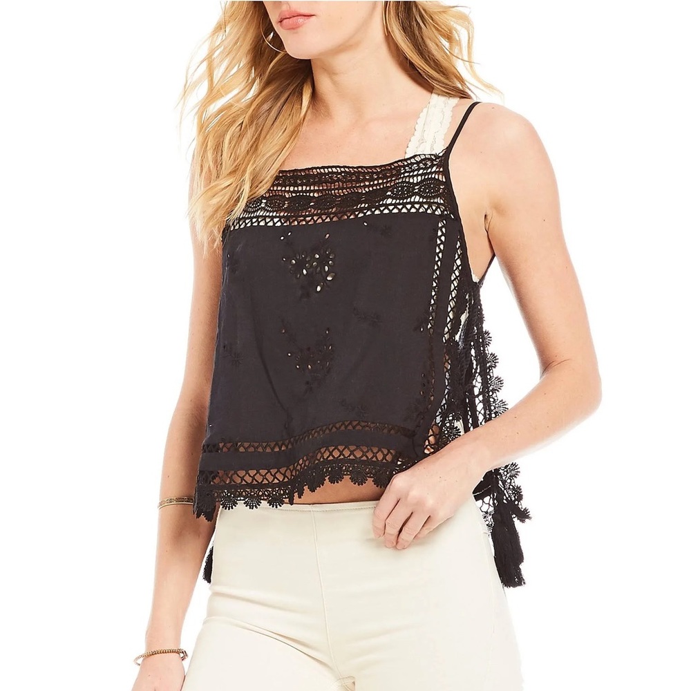FREE PEOPLE Garden Party cami in black.
Size small. Excellent used condition.